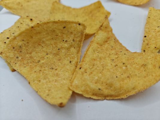 Tomatenaromatisierte Maischips für Liebhaber von leckeren Snacks
