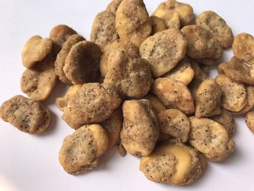 Köstlicher überzogener Puffbohne-Imbiss, gesundes getrocknetes Puffbohnen Cajun-Aroma
