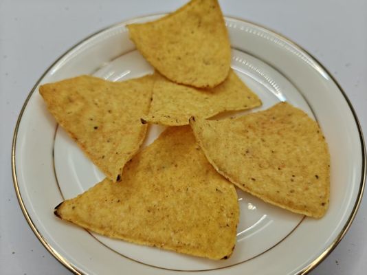 Tomatenaromatisierte Maischips für Liebhaber von leckeren Snacks